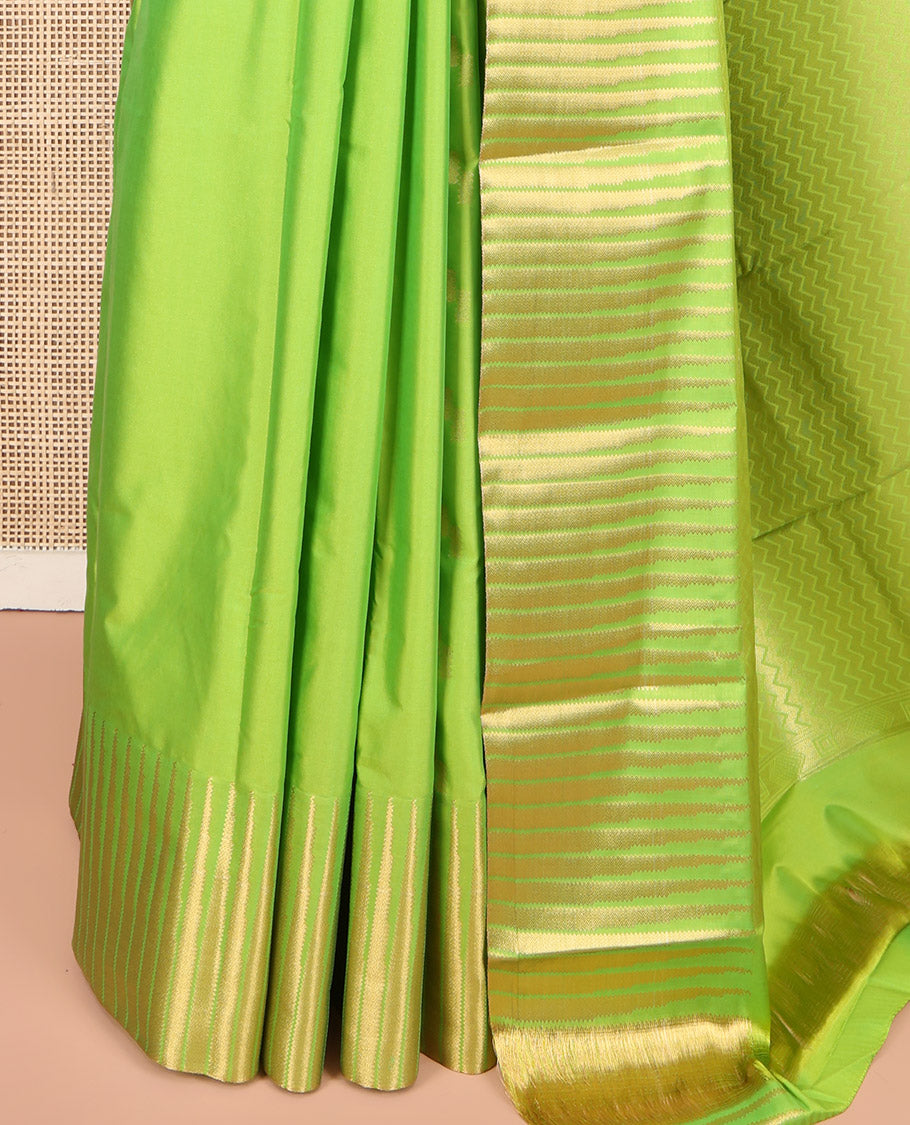 Parrot Green Budget Silk Saree, Sparsely Woven with Zari Buttas All Over Its Body, Highlighted by Temple Zari Border, Gleaming Chevron-Patterned Pallu, and Paired with a Matching Blouse