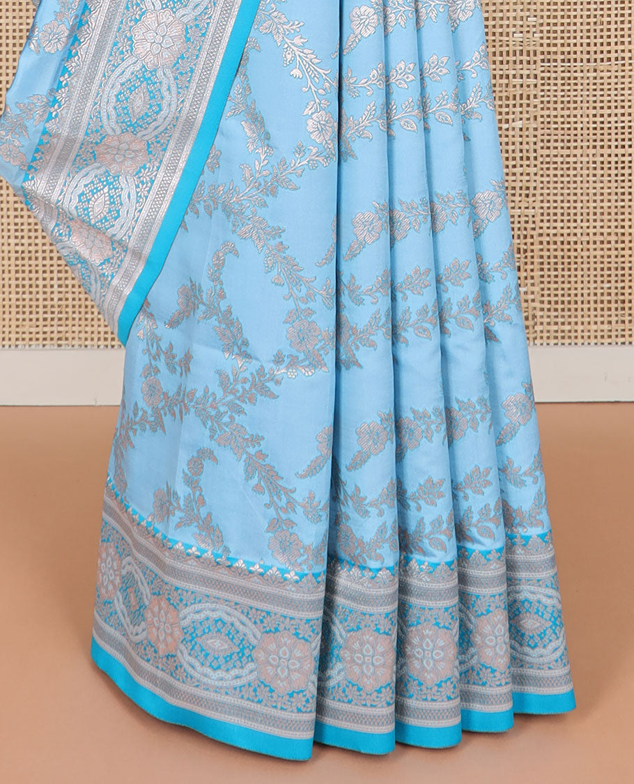 Light blue floral jaal design butter silk saree with self intricate zari design border & floral design pallu