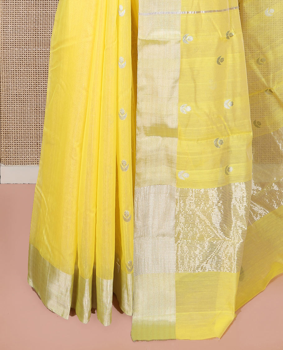 Yellow Chanderi Cotton Saree, Sparkled with Buttas All Over Its Body, Highlighted by a Zari Border, Pallu Steeped with Zari Designs, and Paired with a Matching Blouse
