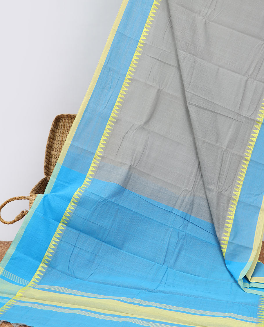 Grey khadi cotton saree with contrast temple border & striped pallu