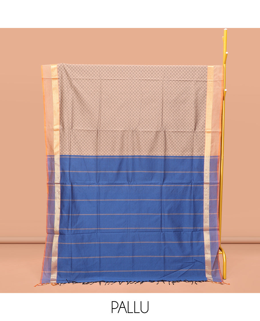 Brown Poly Cotton Saree, Bedecked with Checked Design on Its Body, Highlighted by a Traditional Zari Peacock-Eye Border, Complemented by Contrast Striped Pallu, and Paired with a Contrast Blouse