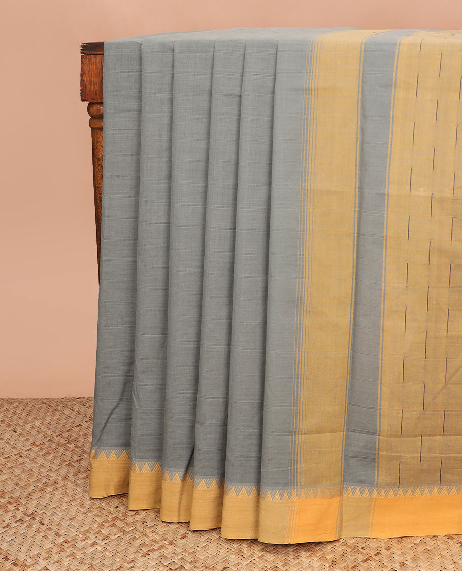 Grey buttas Andhra cotton saree, contrast temple border, and pallu of buttas