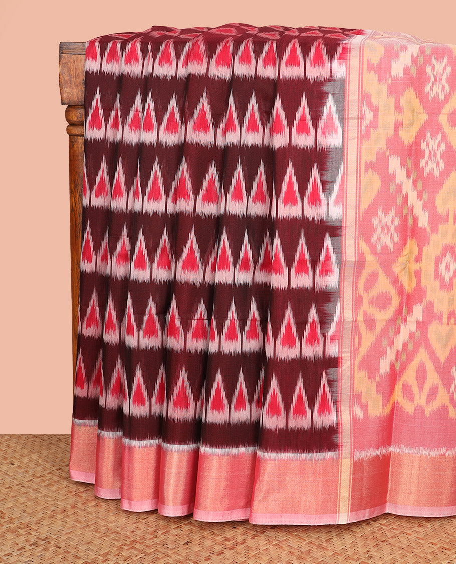 Maroon Ikkat Cotton Saree, Elevated with Ikkat-Style Temple Buttas All Over Its Body, Complemented by a Contrast Zari Border, Pallu of Geometric Designs in Ikkat Weave, and Paired with a Contrast Blouse