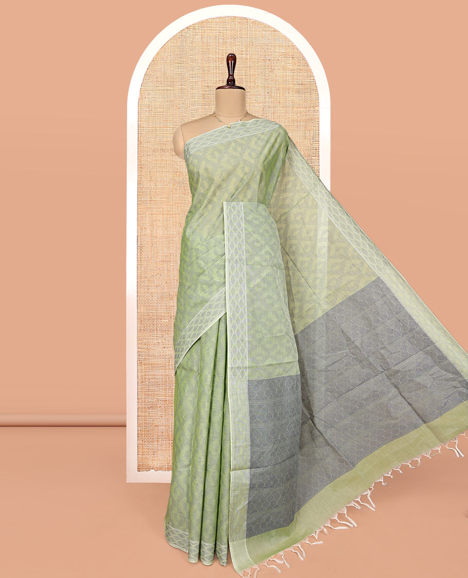 Pale Green Coimbatore Cotton Saree, Subtly Sparkled with Geometric Design on Its Body, a Subtle Diamond Border, Pallu of Ogee Patterns, and Paired with Matching Blouse