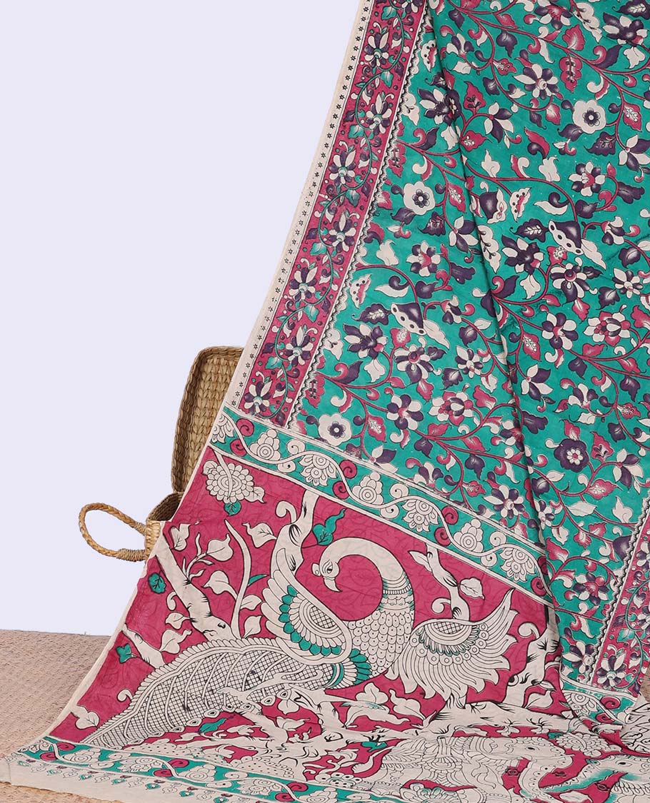 Green floral vine design machine-printed kalamkari cotton saree with contrast floral border & peacock design pallu