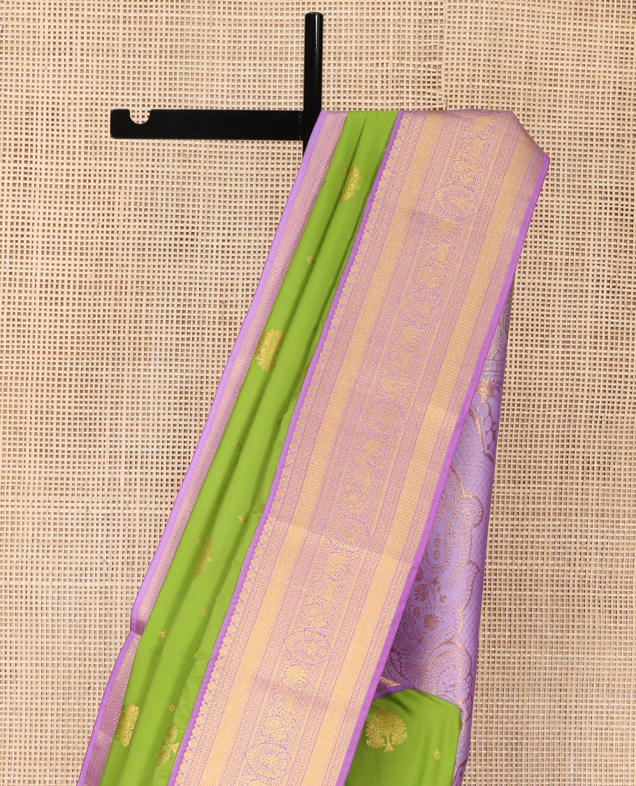Parrot Green Budget Silk Saree, Embellished with Zari Buttas on Its Body, Complemented by a Contrast Traditional Zari Design Border, Grandly Decked Up Pallu, and Paired with a Contrast Blouse