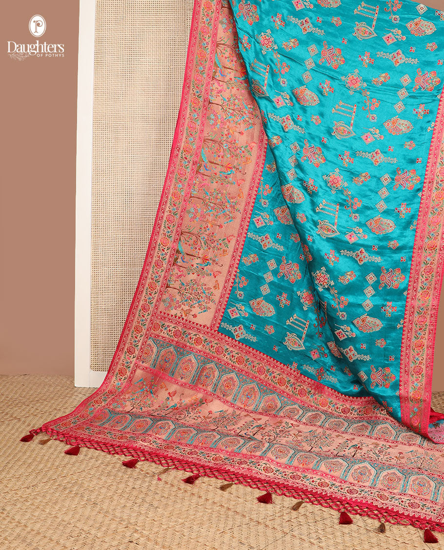 Blue meenakari-style floral printed dola satin silk saree, contrast Tree of life with birds printed border & Mughal-style pallu