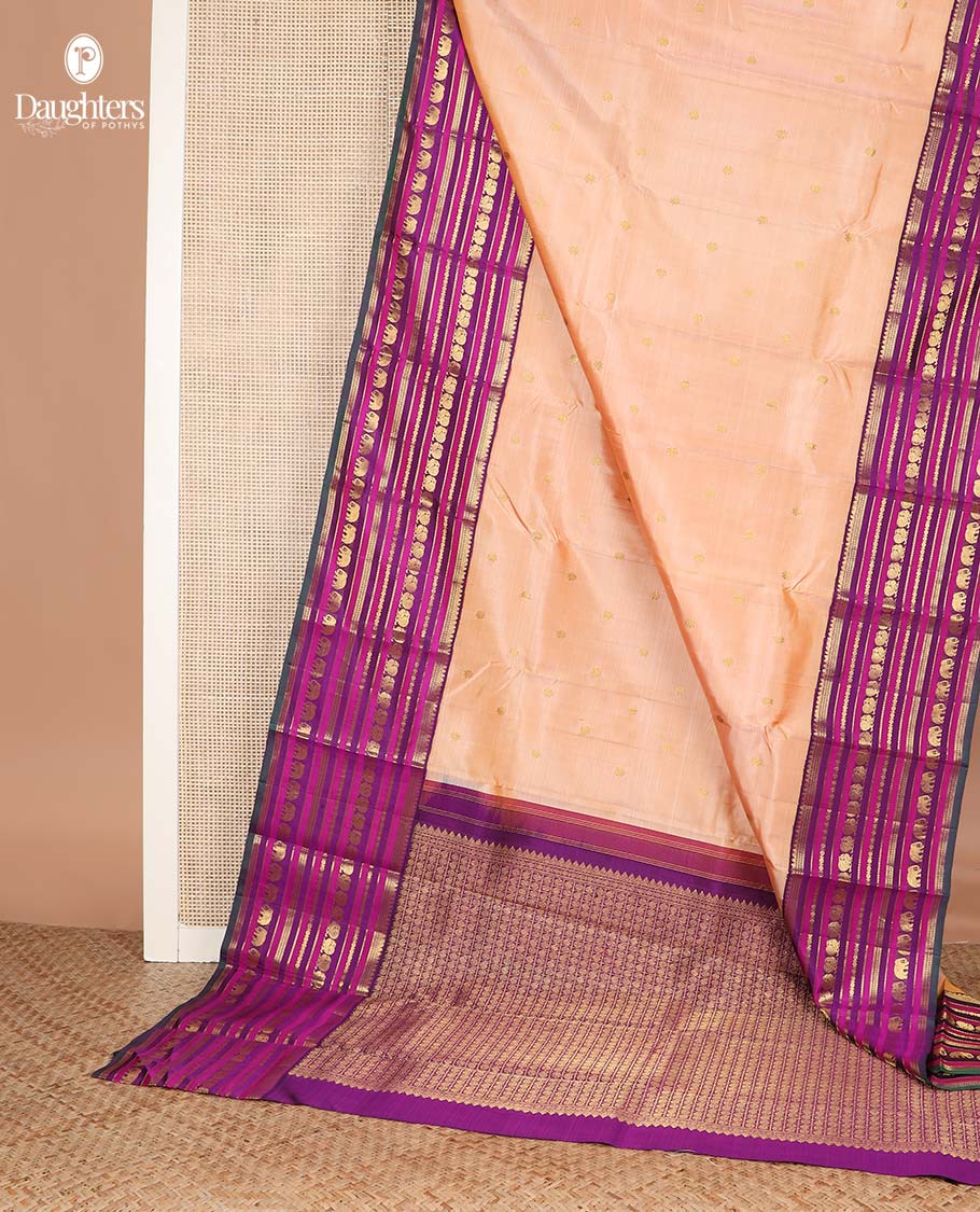 Sandal zari buttas Kanchipuram silksaree, contrast border of thilakam, muthu, laddu kamalam, mayil, and yaanai designs, and butta enclosed checked pallu