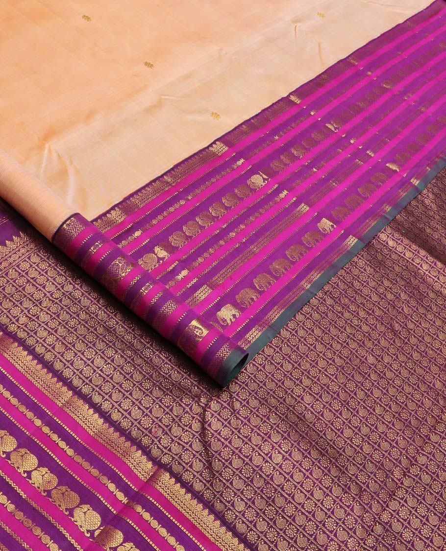 Sandal zari buttas Kanchipuram silksaree, contrast border of thilakam, muthu, laddu kamalam, mayil, and yaanai designs, and butta enclosed checked pallu