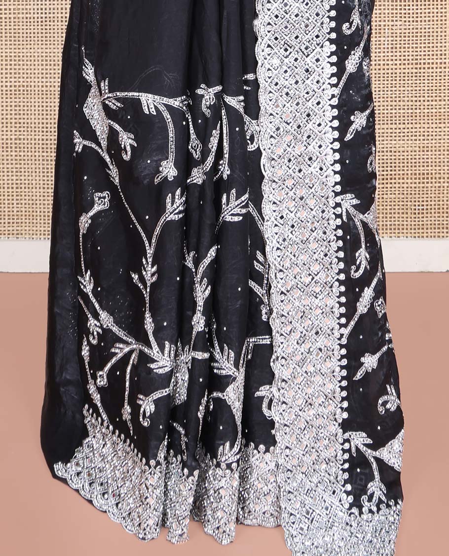 Black Designer Saree, Richly Detailed with Floral-Jaal Style Mixed Embroidery on Its Body, Highlighted by Jaal-Patterned Scallop Embroidered Border, Self-Design Pallu, and Paired with a Heavy Embroidered Matching Blouse
