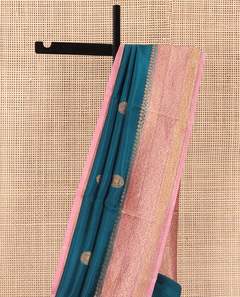 Blue Raw Mango Silk Saree Graced with Buttas, Complemented by a Contrast Traditional Zari-Designed Border, Featuring a Zari-Elevated Pallu, Paired with a Contrast Zari-Striped Blouse