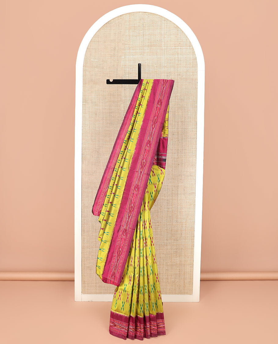 Yellow Ikkat Silk Saree with Cross Buttas Across the Body, Highlighted by a Captivating Contrast Ikkat-Textured Border, Featuring a Pallu Designed with Stripes and Ikkat Texture