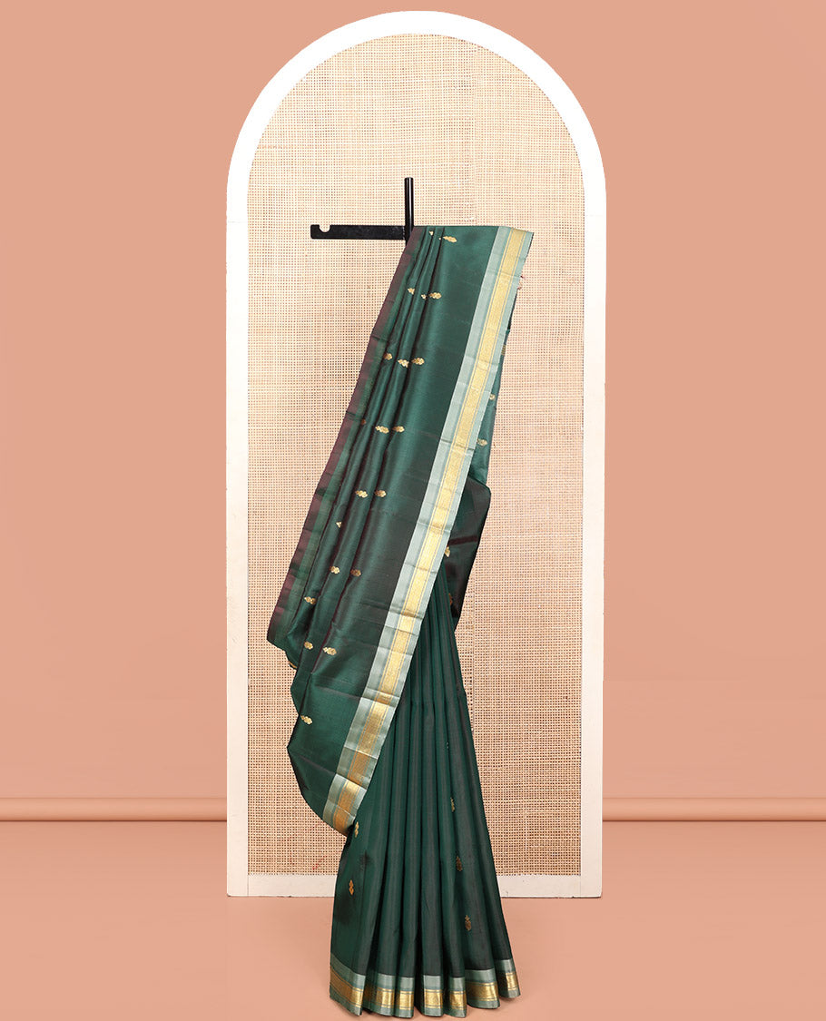 Green Kanchipuram Silk Saree, Embellished with Zari Buttas, a Contrast One-Sided Border of Mayil Kann Designs, a Zari-Design Pallu, and No Blouse