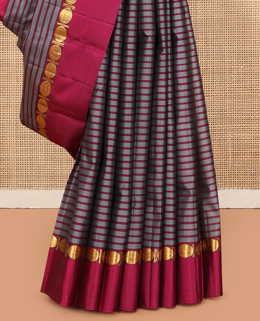 Grey Striped Kanchipuram Silk Saree, Complemented by a Contrast Kal Eragina Border of Rudraskham Design, Pallu of Zari Design, and a Contrast Blouse
