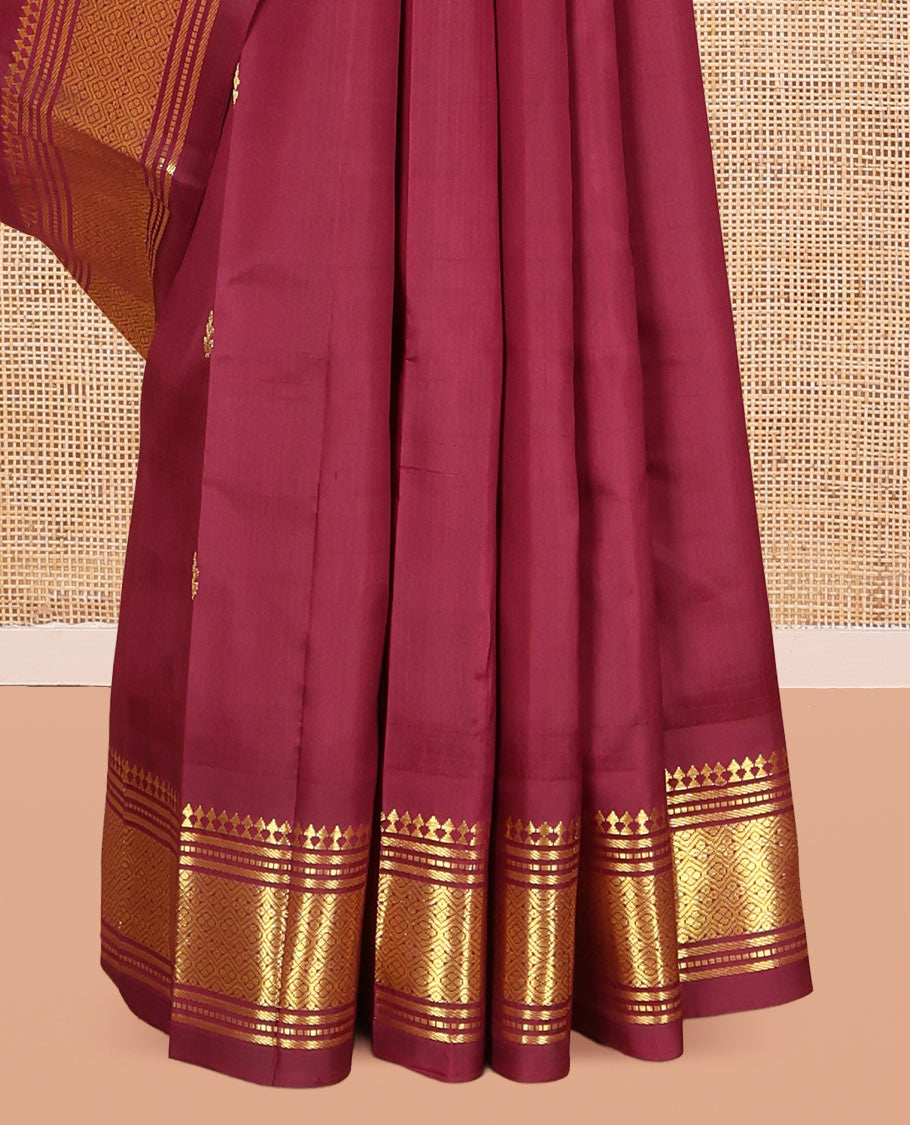 Maroon Kanchipuram Silk Saree, Graced with Zari Buttas, Highlighted by a One-Sided Zari Border of Panner Sombu, Banaras, Muthu, and Jaal Designs, Contrast Grand Pallu, and a No Blouse