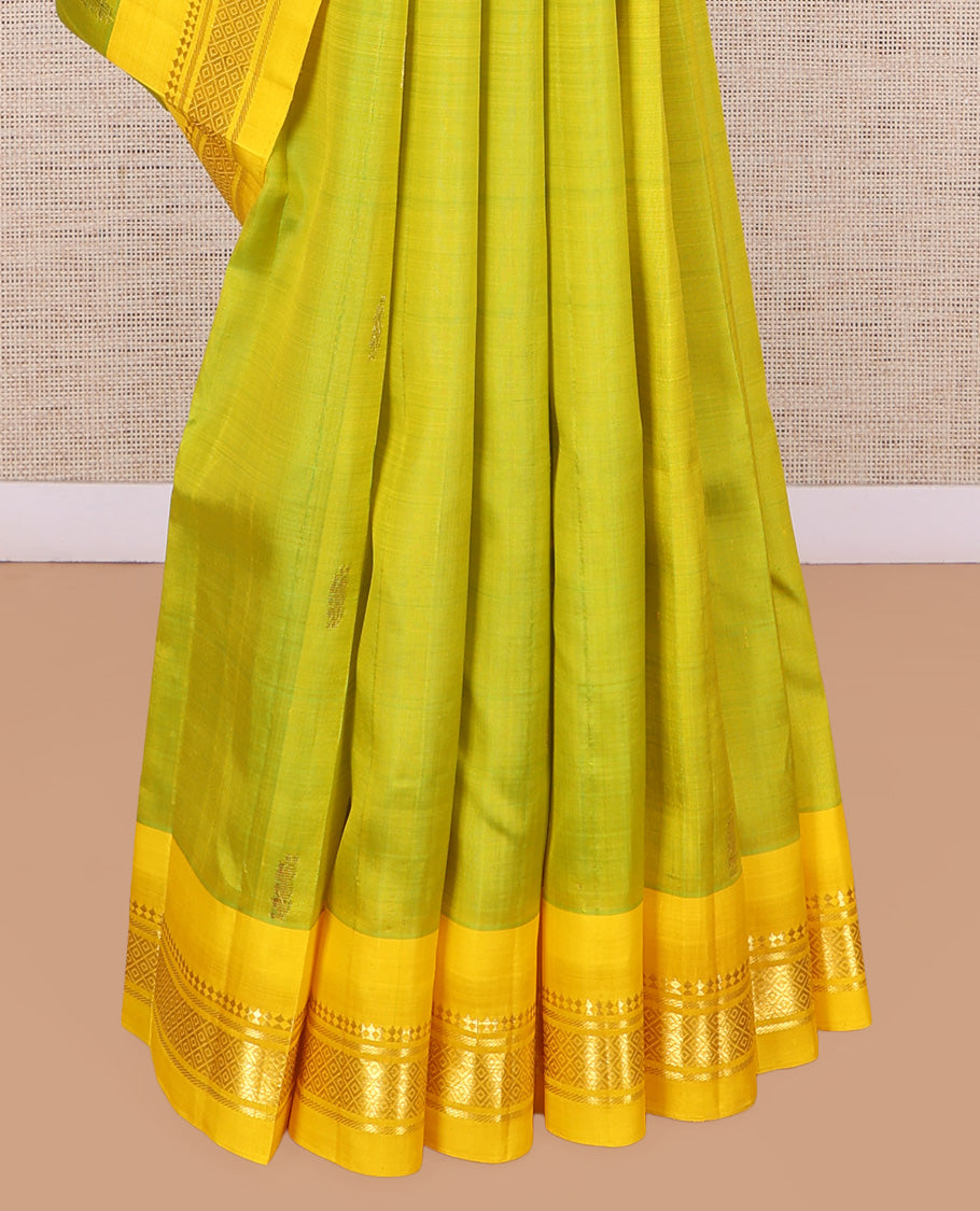 Green Kanchipuram Silk Saree, Subtly Woven with Zari Buttas, a Contrast One-Sided Border of Panner Sombu, Banaras, and Mayil Kann Designs, Zari Design Pallu, and No Blouse