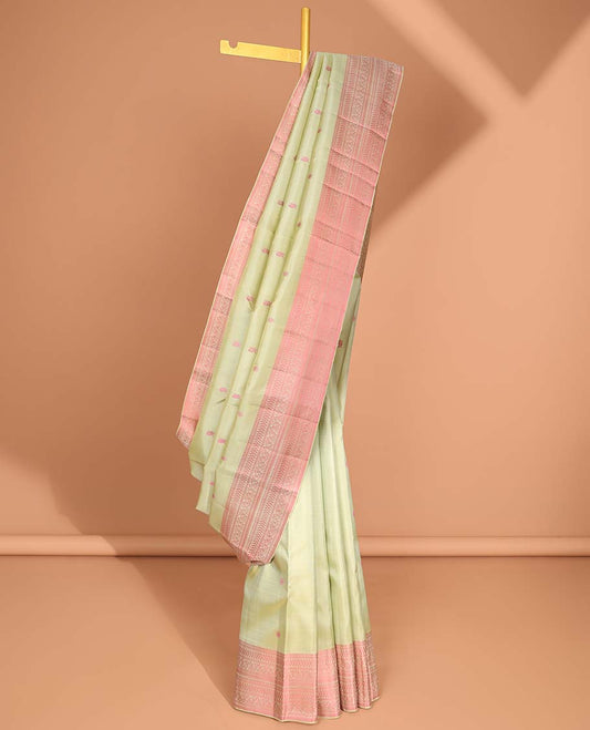 Mint green buttas kancheepuram silk saree with contrast border of rekku, muthu, banaras, poo chakram design & zari design pallu