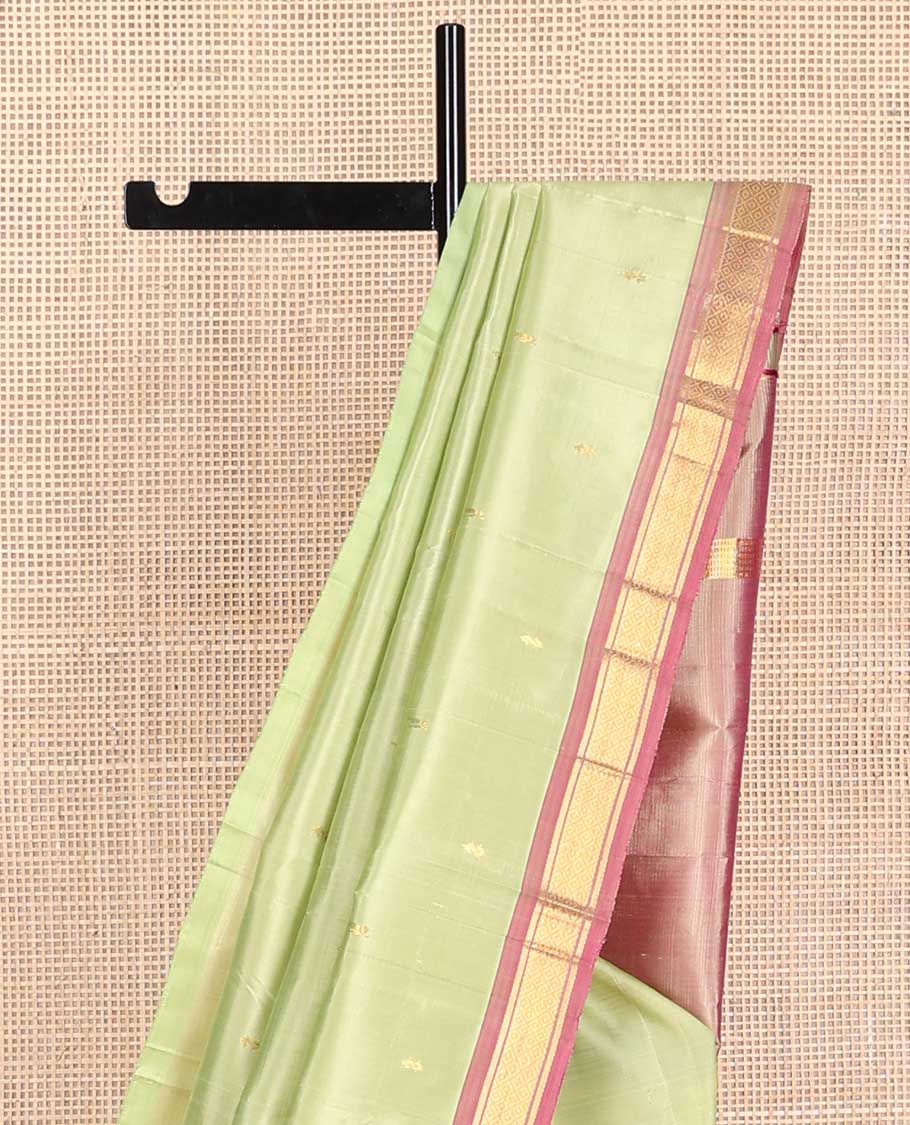 Mint green buttas kancheepuram silk saree with contrast border of banaras, kuyil kann design & zari design pallu