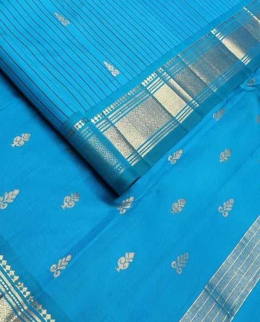 Blue striped & zari buttas Kanchipuram silksaree, one-sided border of panner sombu,banaras,muthu & jaal designs & zari design pallu