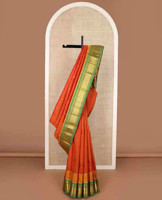 Orange zari buttas Kanchipuram silk saree, contrast border of panner sombu, banaras, muthu & jaal design & pallu of floral & jaal design