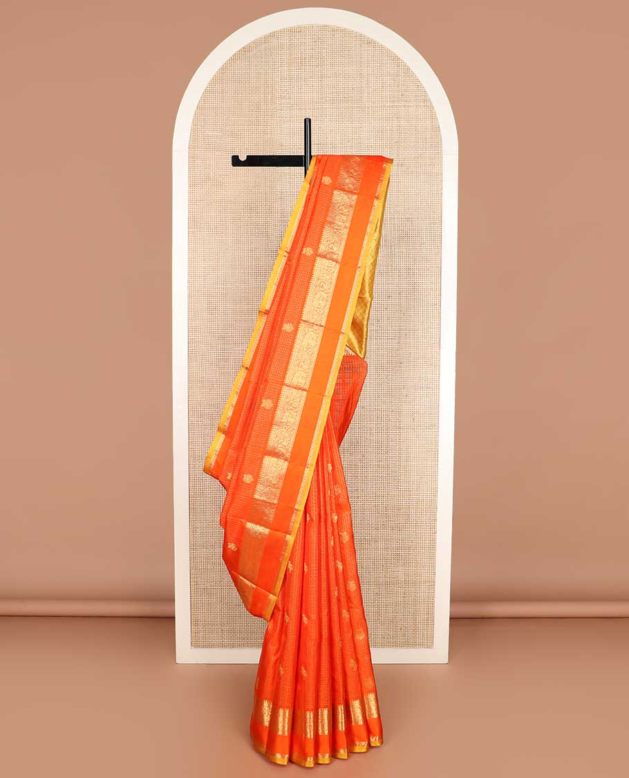 Orange checked with kuthirai and iruthalai pakshi buttas Kanchipuram silk saree, zari border of rekku, paisa, yaanai, mayil, and mayil kann, and paiyadi kattam pallu