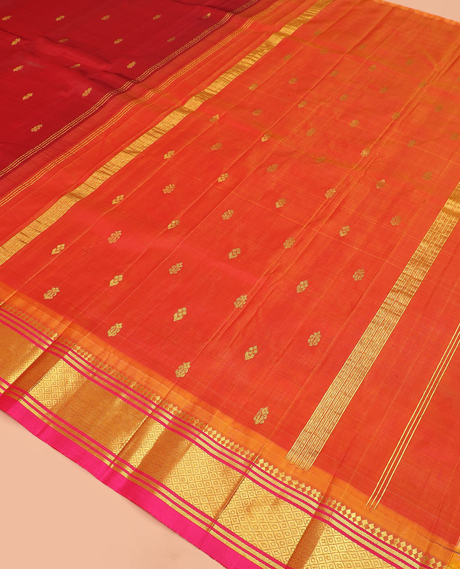 Maroon zari buttas Kanchipuram silk saree, contrast border of paneer sombu, banaras, and mayil kann designs, and zari design pallu