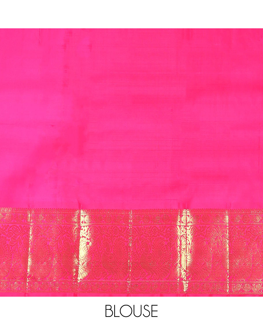 Green dual-tone chakram buttas Kanchipuram silk saree, contrast border of mayil chakram designs, and pallu of chakram buttas