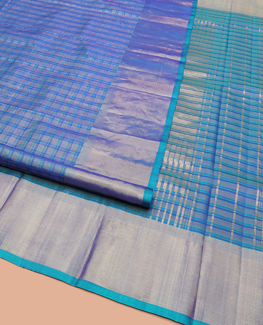 Blue Kanchipuram Silk Saree Highlighted by Checks All Over Its Body, Subtle Self-Border of Zari Designs, Pallu of Traditional Seppu Rekku Designs, and Paired with a Matching Blouse