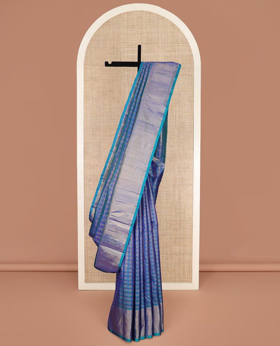 Blue Kanchipuram Silk Saree Highlighted by Checks All Over Its Body, Subtle Self-Border of Zari Designs, Pallu of Traditional Seppu Rekku Designs, and Paired with a Matching Blouse