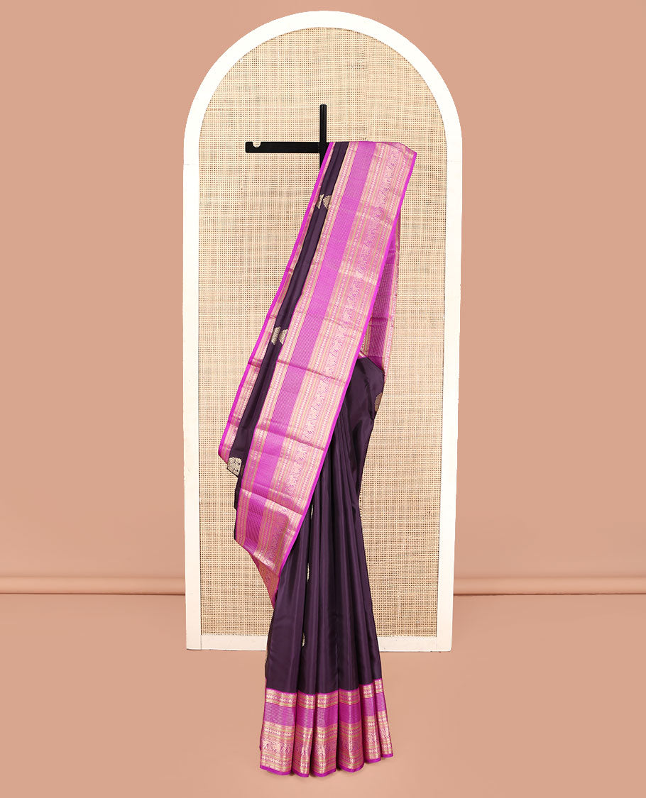 Eggplant Purple Kanchipuram Silk Saree, Adorned with Zari Buttas on Its Body, Complemented by a Contrast Border of Rekku, Neli, Paisa, Muthu, Banaras, Kuthirai, and Yaanai Designs, Grand Jaal Pallu, and Paired with a Contrast Blouse