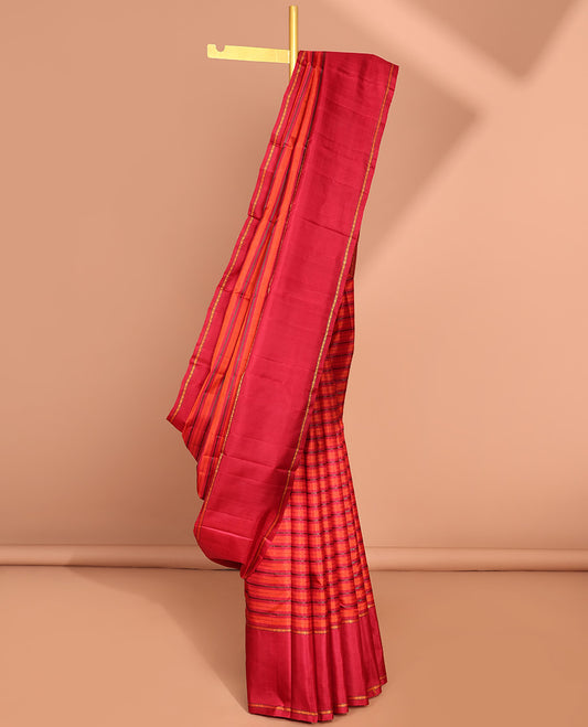 Red striped kancheepuram silk saree  with contrast rettai pettu border & pallu of argyle pattern