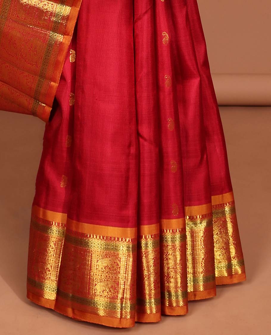 Red paisley buttas kanchipuram silk saree with contrast border of intricate zari design border & zari design pallu