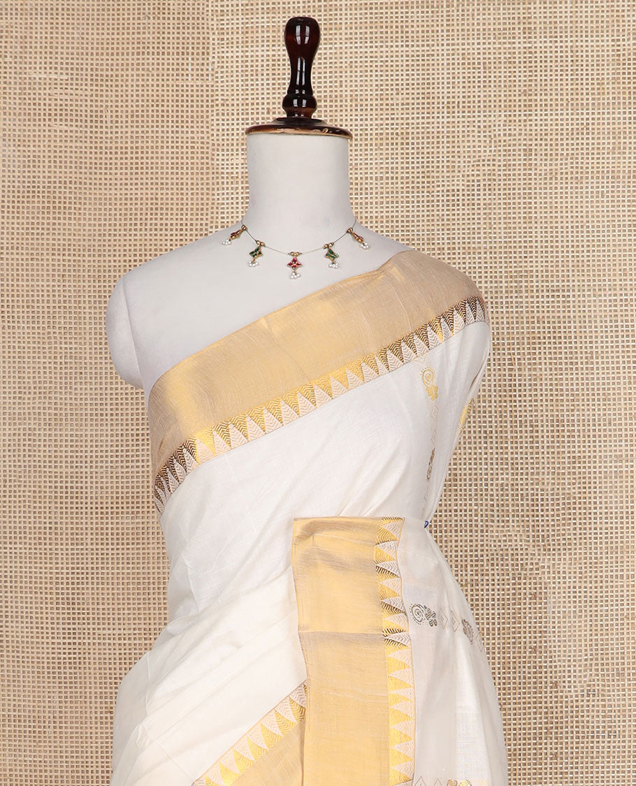Cream zari design Kerala saree, zari temple border, and pallu of temple and floral designs
