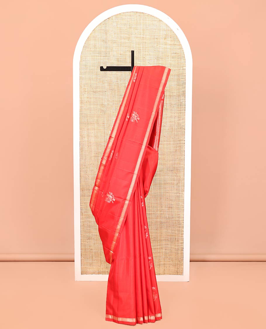 Red Mayuri Soft Silk Saree, Gleamed Up with Zari Buttas All Over Its Body, Subtle Zari Piping Border, Pallu of Geometric Designs, and Paired with a Matching Blouse