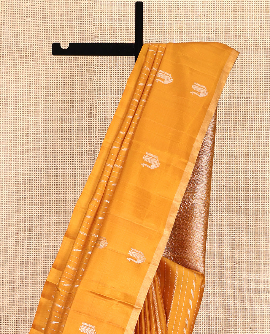 Mustard Mayuri Soft Silk Saree Elevated with Neli and Muthu Stripes On Its Body, Highlighted by Peacock Motifs Border, Jaal Pallu and Paired with a Matching Blouse