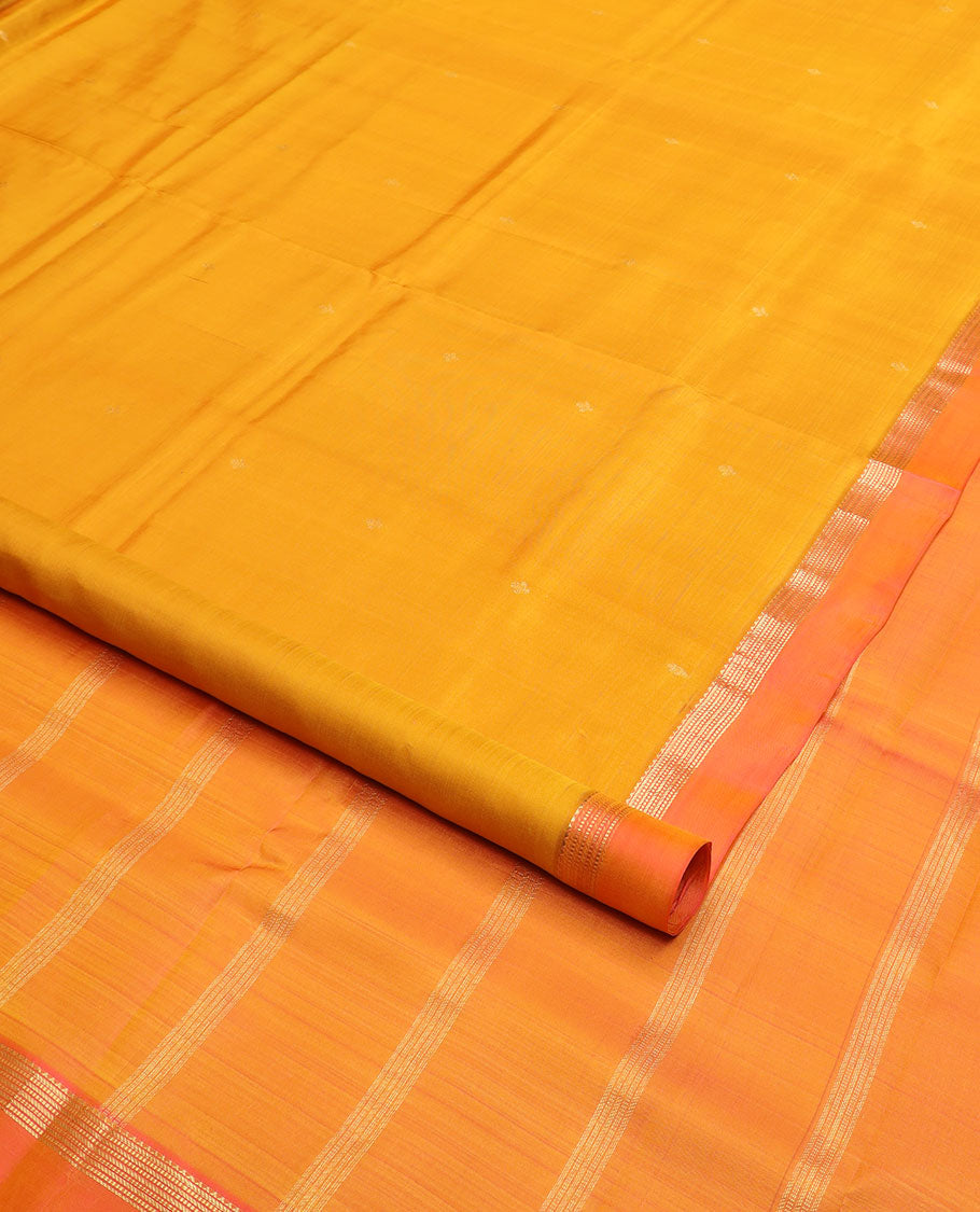 Orange zari buttas nine-yard silk saree, contrast kaal erangina border of rekku and Muthu designs, and pallu of zari designs