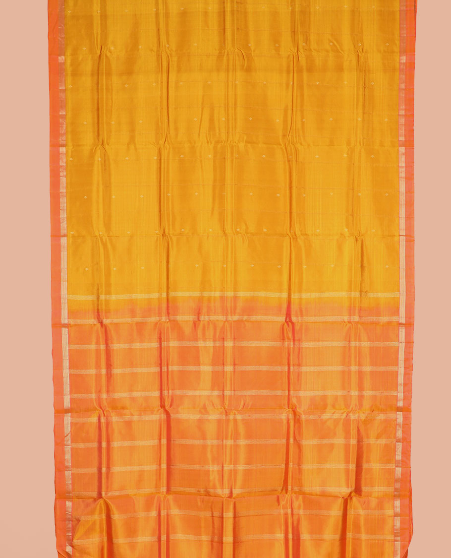 Orange zari buttas nine-yard silk saree, contrast kaal erangina border of rekku and Muthu designs, and pallu of zari designs
