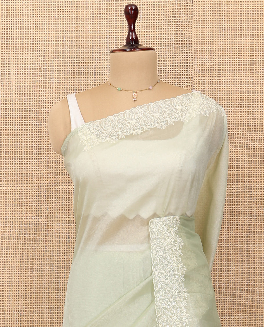 Pale Green Plain Organza Saree, a Subtle Scallop Floral-Embroidered Border, and Matching Blouse