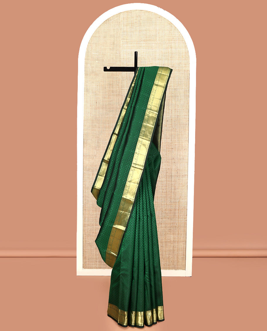 Green Embossed Parampara Silk Saree, Elevated with Zari Border of Thilakam, Mayil, Yaanai, Mayil Kann, and Manga Designs, Grand Jaal Pallu and Paired with a Matching Blouse