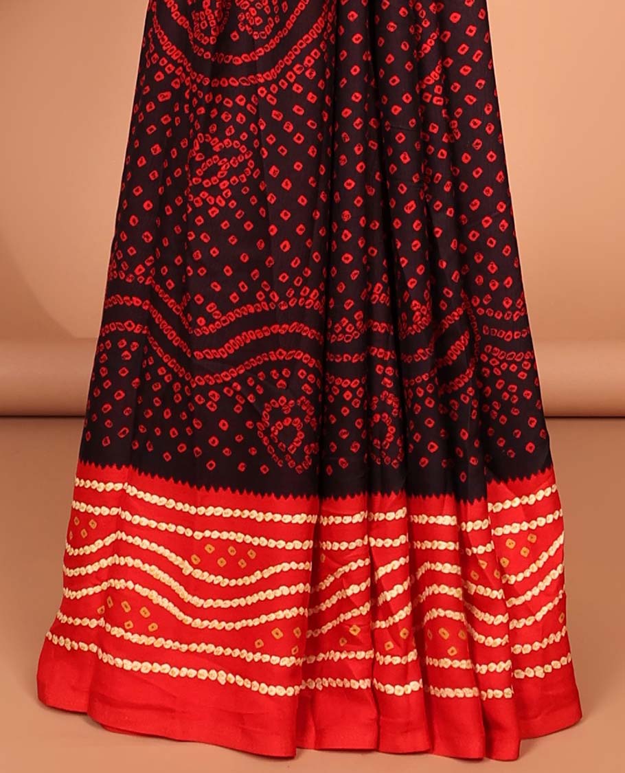 maroon all over bandhani printed crepe silk saree with contrast bandhani printed border