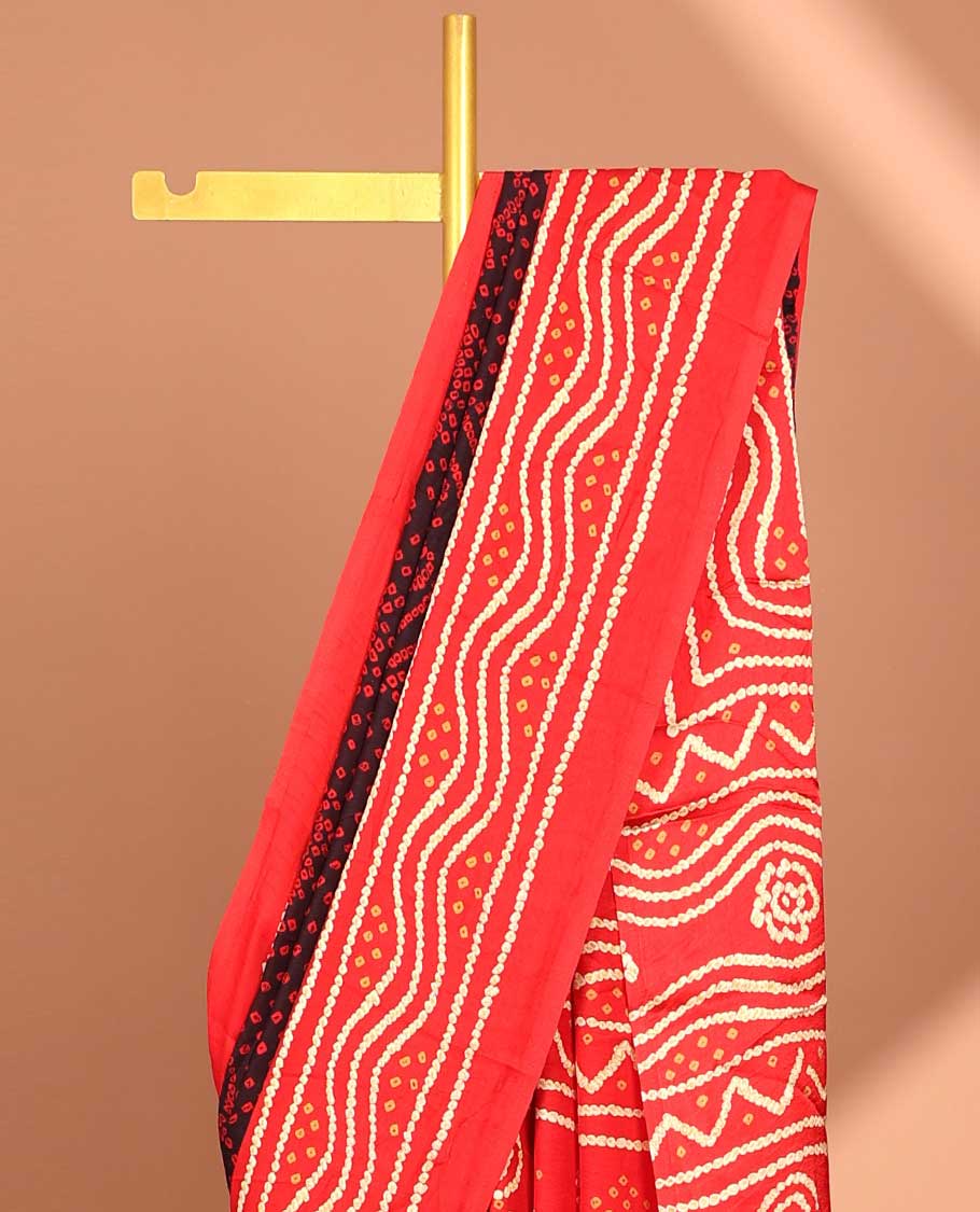 maroon all over bandhani printed crepe silk saree with contrast bandhani printed border