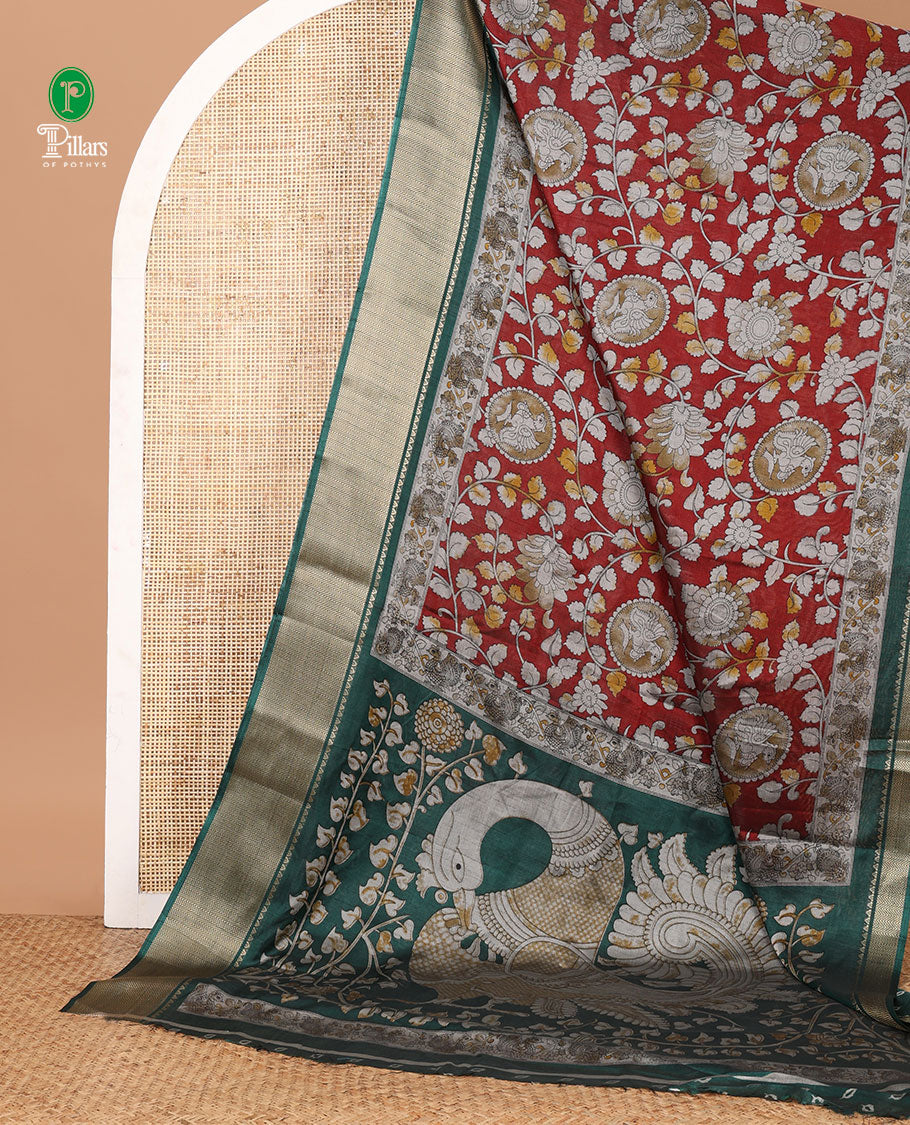 Maroon kalamkari-style round peocock & floral vine printed dola silk saree,contrast chevron zari border & peacock pallu