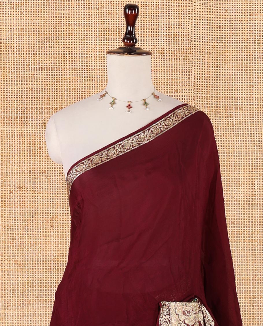 Purple plain crepe saree, zari border steeped with rose floral designs, plain pallu & blouse of zari polka dots