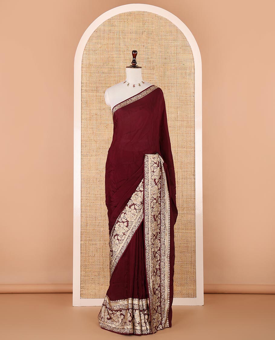 Purple plain crepe saree, zari border steeped with rose floral designs, plain pallu & blouse of zari polka dots