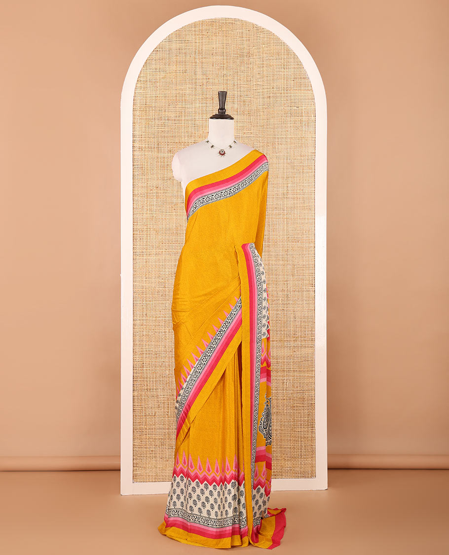 Gold plain crepe silk saree, contrast floral & geometric block printed-style border, printed pallu & contrast plain blouse