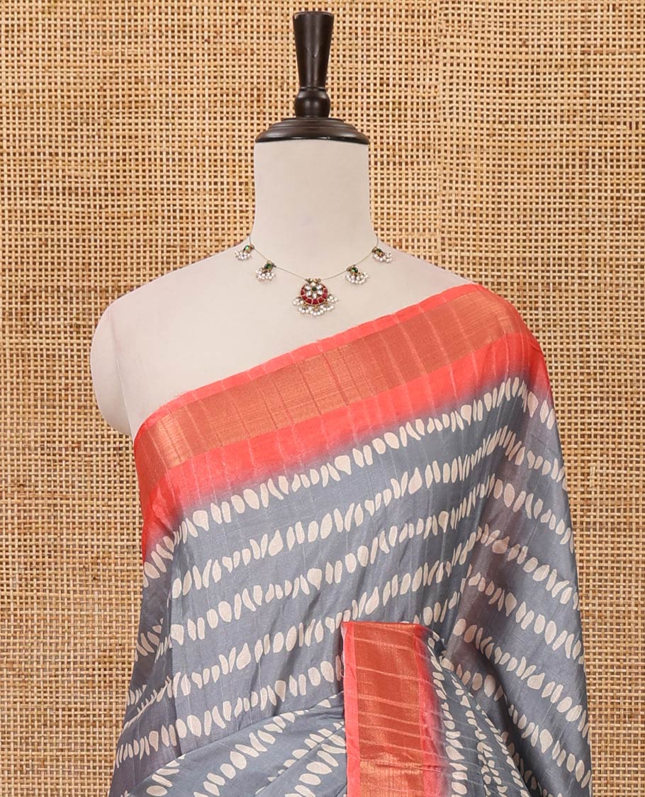 Grey uniquely printed soft tussar saree, contrast zari border, kalamkari floral vine printed pallu & kalamkari printed blouse
