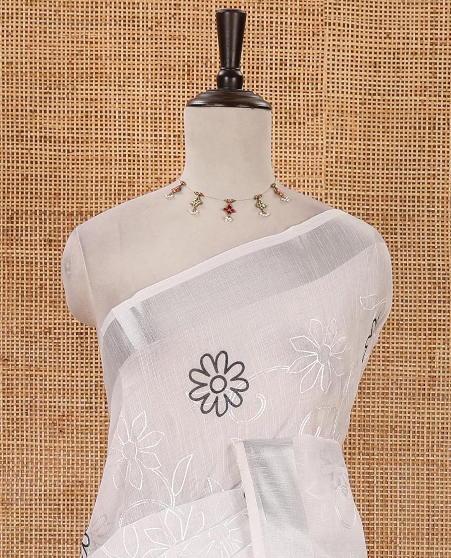 White flower motifs print & floral vine thread embroidered linen saree, zari bavanji border, village-theme handpainting-style printed pallu & blouse of print & embroidery