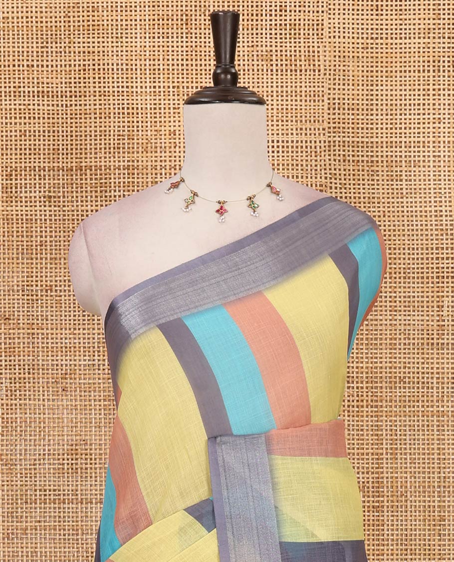 Multi-colored stripes-block linen saree, zari bavanji border, plain pallu & printed blouse