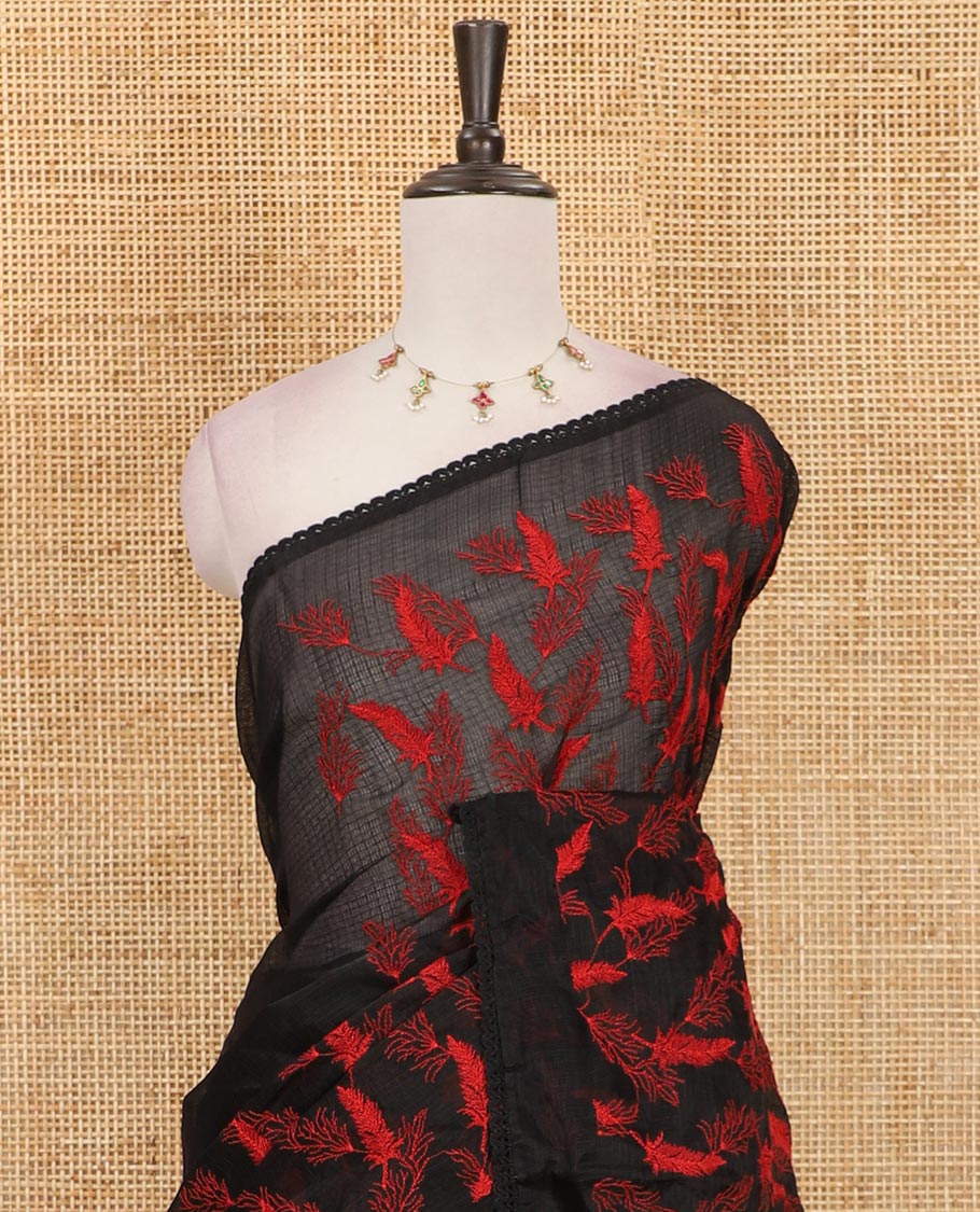 Black all-over feather motifs, red-color thread embroidered Kota chex saree, lace border, and plain black blouse
