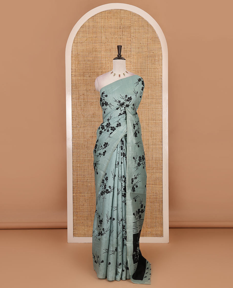 Borderless green five petal floral motifs printed semi tussar saree, self-pallu of floral print, and printed blouse